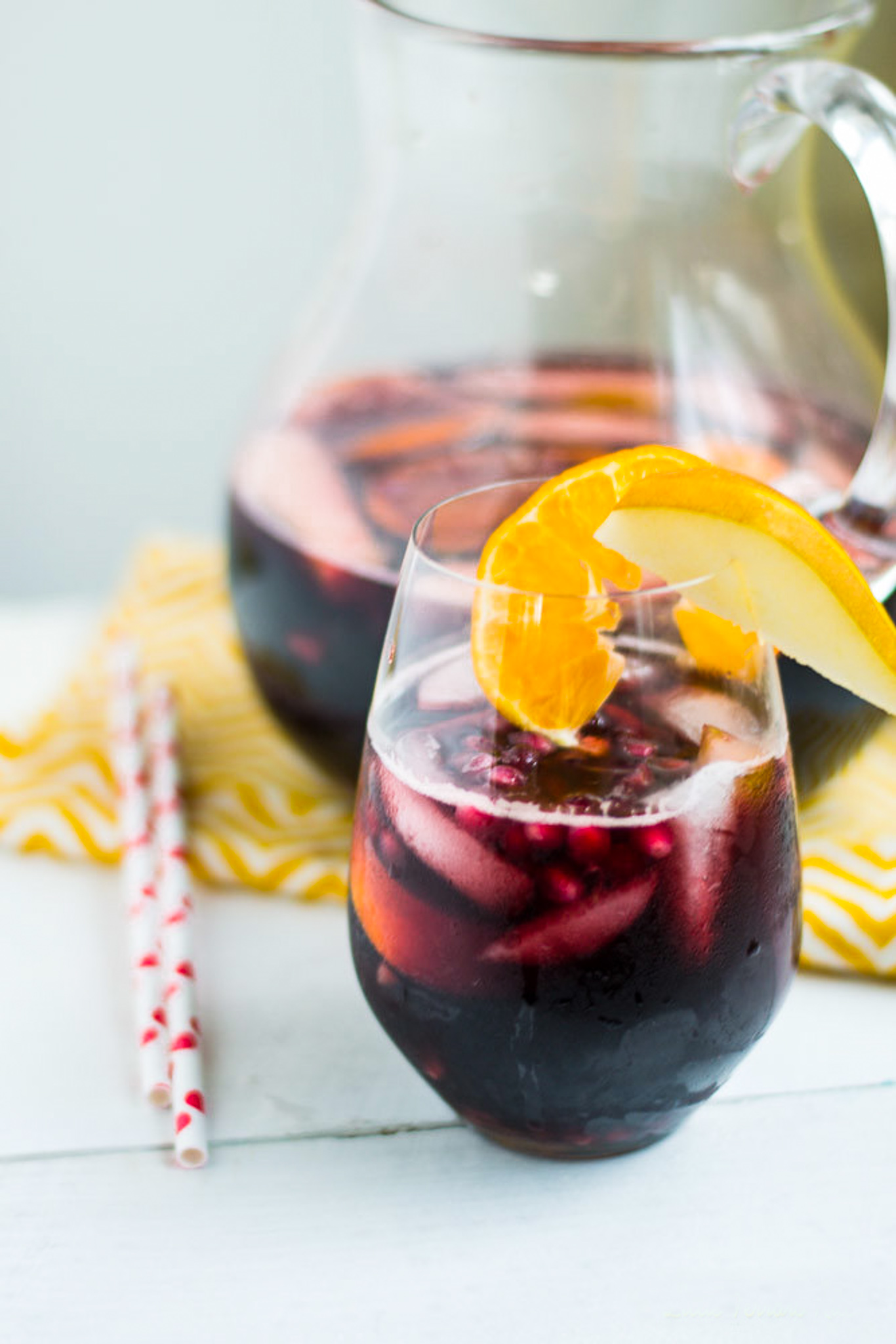 Glass of pear pomegranate sangria